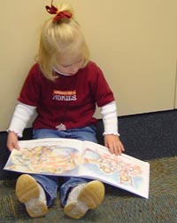 A little girl reading